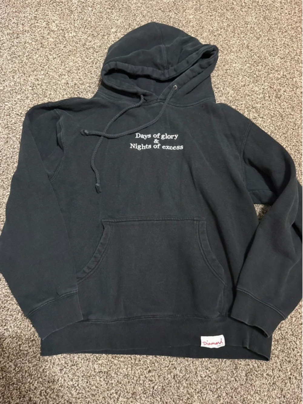 Diamond Supply Co. black pullover hoodie with “Days of glory & Nights of excess”